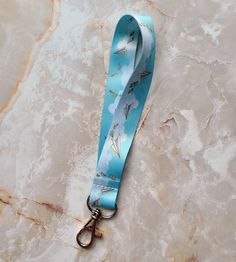 "A fantastic lanyard/keyring/badge holder with paper planes soaring through the clouds design The image is dye-sublimated onto the fabric on both sides and is fade resistant with a durable lobster claw clasp at the end for all your attaching needs! It is about 6.5\" long folded, excluding the clasp. It'd be great adorning your keys, attached to an ID card, or as a badge lanyard for a convention! Matching lanyards are also available: https://www.etsy.com/listing/1222149896/paper-planes-lanyard-lo Cute Love Notes, Anime Lanyard, Company Card, Sky Anime, Bus Pass, Paper Planes, Badge Lanyard, Wrist Lanyard, Clouds Design