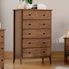 a wooden dresser sitting on top of a hard wood floor