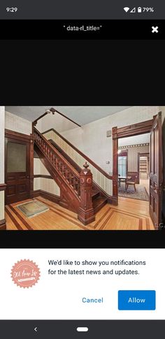 an image of a house with stairs and wood floors