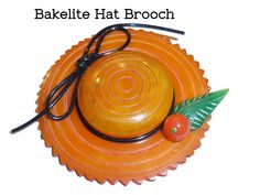 "Rare Bakelite Figural Hat Brooch. Yellow Bakelite Pin. Collector's Piece. Tested. Circa 1940s. SIZE: about 2.25\" in diameter CONDITION: Previously owned / USED / 80 Years old with expected wear and tear. PLEASE VIEW ALL PHOTOS AT FULL SIZE for the very best description. Please know what you are buying to avoid any surprises after purchase. Over all very nice vintage with expected wear and tear. No chips, cracks or crazing to the bakelite noted. Similar pins are shown in all of the major bakeli Hat Brooch, Antique Clothing, Reference Books, 80 Years, Hat Pins, Vintage Buttons