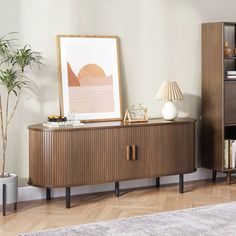 a living room scene with focus on the sideboard