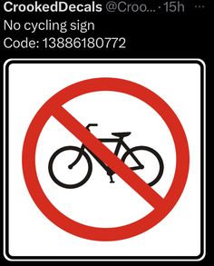 a red and white sign with a bicycle in the bottom right hand corner that says no bicycles