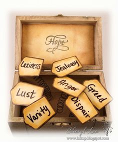 an open wooden box with writing on it