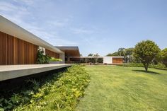 an exterior view of a modern house in the countryside