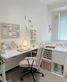 a white desk and chair in a room