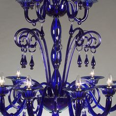 a blue chandelier with many lights on it