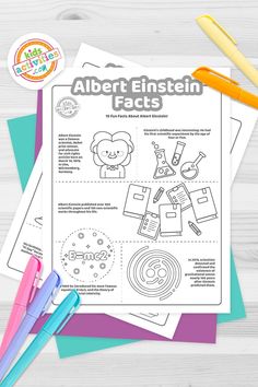 an adult coloring book with the words albert einstein fact on it next to markers and pens