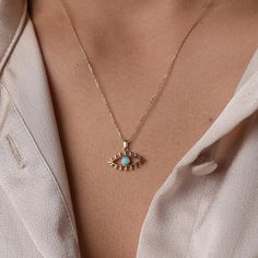 Add a touch of mystical charm to your outfit with this stunning Turquoise Evil Eye Lash Necklace in 14K Gold. Featuring delicate Cz eyelashes and a mesmerizing turquoise evil eye charm, this dainty piece is perfect for adding a layer of protection to your jewelry collection. Wear it alone for a simple yet eye-catching look, or layer it with your favorite pieces for a personalized style statement. This Evil Eye necklace is a must-have for anyone who loves unique and meaningful jewelry Product Det December Birthday Gifts, Evil Eye Necklace Gold, Evil Eye Protection, Solid Gold Chains, Protection Necklace, Meaningful Jewelry, Birthday Jewelry Gift, Evil Eye Charm, Christmas Gift Jewelry