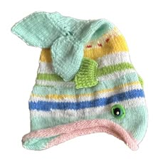 A handmade knit fish-shaped hat is a delightful and whimsical creation! Picture a cozy hat that is expertly crafted with soft yarn, lovingly transformed into the shape of a fish. The hat is designed to resemble a cute little fish, complete with fins and a tail, making it a fun and unique accessory for anyone to wear. The vibrant colors of the yarn bring the fish to life, adding a playful touch to the hat. Imagine a combination of shades like blues, greens, and even a splash of yellow or orange, Kidcore Hat, Fish Beanie, Knit Fish, Fish Clothes, Fish Outfit, Whimsical Clothes, Fish Hat, Best Winter Hats, Fun Hats