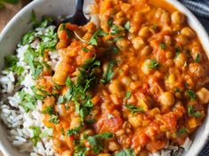 a bowl filled with rice, beans and cilantro garnished with parsley