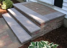 steps leading up to the front door of a house