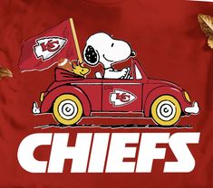 a red shirt with a cartoon dog in a car and the words chiefs on it