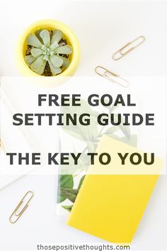 a desk with a yellow binder, notebook and plant on it text reads free goal setting guide the key to you