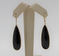 "Beautiful dangle earrings.  Vintage gold handmade earrings with a black onyx stone as a drop. Authentic 14K yellow gold black onyx drop earrings, excellent condition. Earring length: 2.21\" (56.03mm) Earring width: 0.55\" (13.92mm) Earrings weigh: 9.3g Will be placed into a suitable gift box. Free shipping within the U.S." Elegant Yellow Gold Onyx Earrings, Luxury Black Drop Jewelry, Luxury Onyx Drop Earrings, Black Dangle Earrings Fine Jewelry, Elegant Onyx Drop Jewelry, Formal Onyx Gemstone Earrings, Black Teardrop Fine Jewelry Earrings, Luxury Yellow Gold Onyx Earrings, Elegant Teardrop Onyx Jewelry