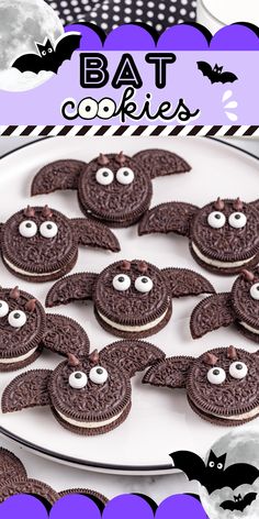 there are cookies decorated like bats on a plate with the words bat cookies above them