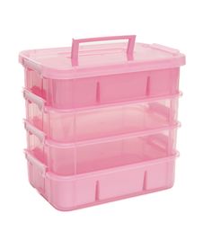 three pink plastic storage containers stacked on top of each other