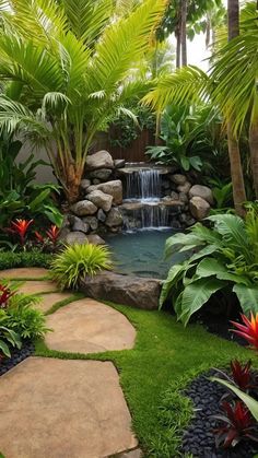 a garden with lots of tropical plants and water fall in the center, surrounded by lush greenery