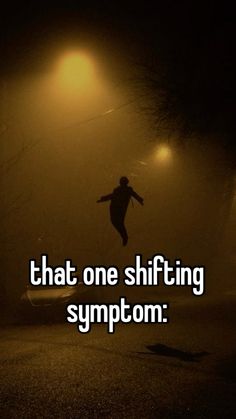 a person jumping in the air on a foggy night with text that reads, that one shifting sympton