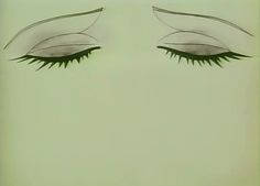 the eyes and eyelashes of a woman with long lashes are drawn in black on a green background