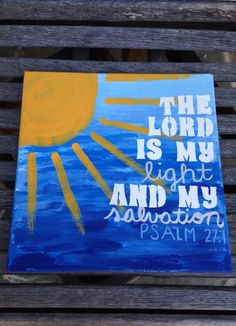 the lord is my light and my salvation painted on a bench