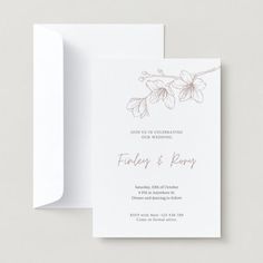 a wedding card with flowers on it