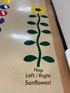 a sign on the floor that says hop left / right sunflower