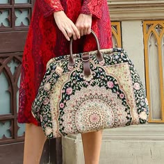 Step into a world of enchantment with our Mary Poppins Inspired Carpet Bag, a meticulously crafted homage to the iconic bag from the beloved movie.  The main body of the bags is made with thick chenille carpets. The handles and belts are genuine leather with heavy cotton canvas lining. Six bronze stands at the bottom allow the bag to stand stably. Every bag comes with a detachable and adjustable shoulder strap (55 inches) made from the same chenille as the bag and fixed with high-quality bronze Mary Poppins Carpet Bag, Mary Poppins Bag, Poppins Bag, Victorian Carpet, Textile Flowers, Carpet Bags, Beloved Movie, Overnight Travel Bag, Jeans For Girls