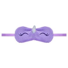 a purple sleeping mask with eyes closed