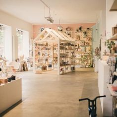 the inside of a store with lots of shelves