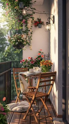 an outdoor table and chairs on a balcony with potted plants hanging from the ceiling