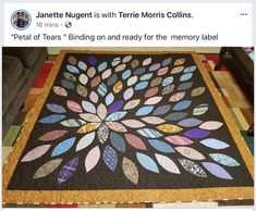 an image of a quilt on the floor that is being displayed for people to see