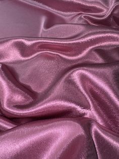 Dusty pink crepe back satin This high-quality satin fabric is a perfect choice for any project that requires a touch of elegance and sophistication. The 58-inch width make it suitable for a wide range of applications, from apparel to home decor and crafts. The fabric comes in a beautiful shade of silver, which adds a classy and luxurious feel to any design. Ideal for use in bridal dresses, blazers, curtains, and even marquees, this shiny crepe back satin fabric offers excellent drape and durability. Whether you are a professional designer or a DIY enthusiast, this fabric is sure to inspire your creativity and help you create stunning and unique creations. Get your hands on this gorgeous fabric today and let your imagination run wild! Delivery All items are dispatched within 1-2 working day Color Knowledge, Crushed Velvet Fabric, Deco Dress, Pink Lavender, Metallic Pink, Gorgeous Fabrics, Crushed Velvet, Dusty Pink, Satin Fabric