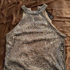 Cable And Gauge Sequined, Sleeveless Top, Lined. Sz Lg. Sleeveless Camisole For Evening Parties, Sleeveless Camisole For Party Season Evening, Party Sleeveless Camisole, Glamorous Sleeveless Camisole For Party Season, Stretch Sleeveless Tank Top For Party, Glamorous Sleeveless Tank Top For Party Season, Spring Sleeveless Blouse Tank Top For Party, Glamorous Sleeveless Vest For Party, Glamorous Sleeveless Party Vest