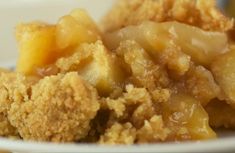 a close up of a plate of food with some type of dessert on top of it