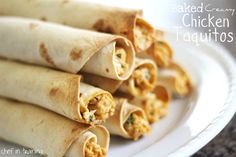 chicken and cheese burritos stacked on a white plate with the words chicken and tortillas