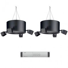 two black lamps are hanging from the ceiling