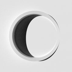 an image of a moon in the middle of a white circle with black trim on it