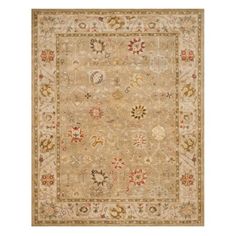 a beige rug with many different colors and designs on the carpet, including an ornate border