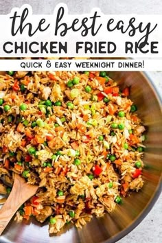 the best easy chicken fried rice recipe in a bowl with a wooden spoon on top