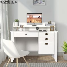 a white desk with a computer monitor and keyboard sitting on top of it next to a chair