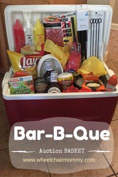 a cooler filled with lots of food and condiments on top of a tile floor