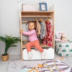 Efficiently organizing space in a child's room can be challenging, but not when you have Montessori furniture to help. Montessori Clothing Rack Clouds is an open hanger with shelves, perfect for storing clothes, toys, decor, and other treasures. Moreover, the child can freely use this interior element since such a wardrobe is at the child's height, promoting toddler independence and helping develop essential practical skills like keeping the room tidy, choosing items for a walk, organizing toys Montessori Clothing Rack Diy, Montessori Clothes Rack, Kids Clothes Rack For Costumes, Kids Clothes Hanger Stand, Toddler Independence, Doll Clothes Hanging Rack, Kids Clothes Storage, Independent Toddler, Organizing Toys