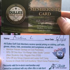 someone is holding up a golf card for the club's official member to be awarded