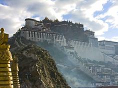 a large building on top of a mountain