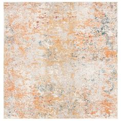 an orange and white rug with faded paint on the top, in different shades of gray