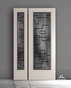 two doors with black and white designs on them