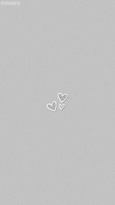 two hearts drawn in white on a gray background