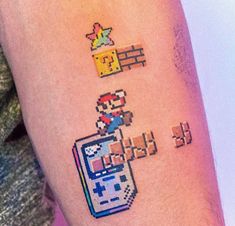 a person with a pixel tattoo on their arm