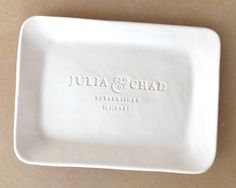 a white plate with the name julia and chad on it