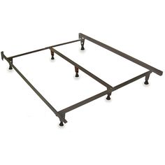 a metal bed frame with wheels on it